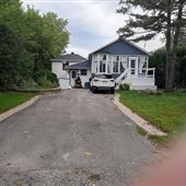Maison directement sur le bord de la rivière des Mille-Îles